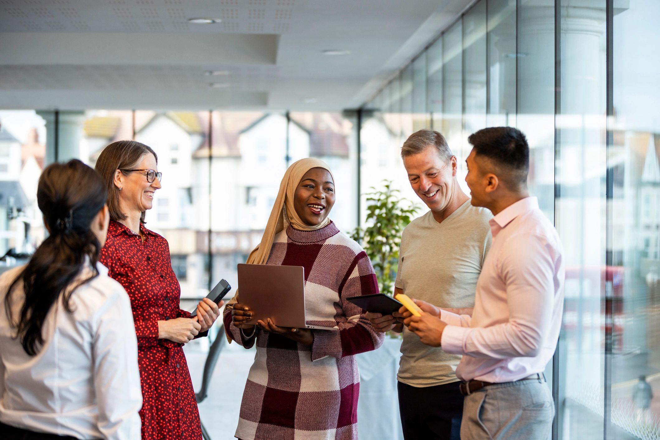 Diverse professionals meeting in a modern office