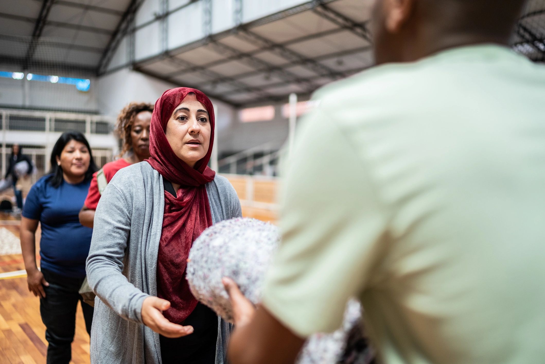 Community support scene representing humanitarian assistance